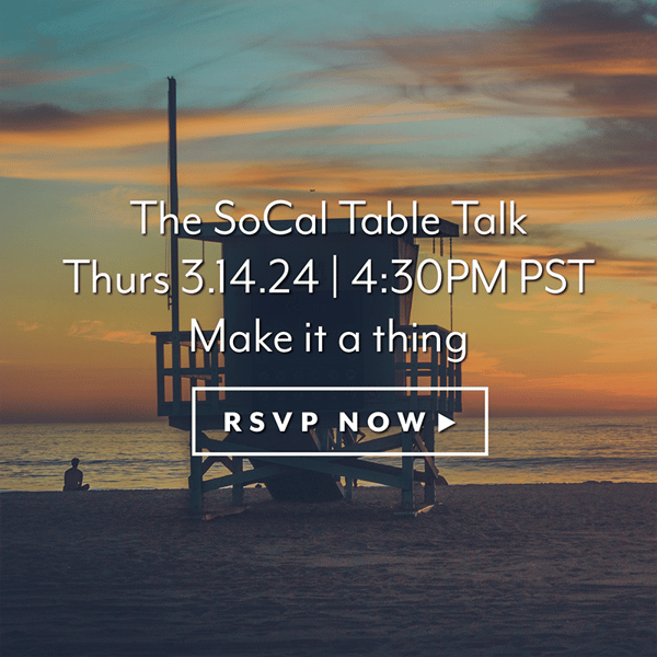 life guard tower on a beach during sunset